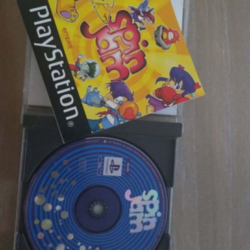 Sony PlayStation 1 console used with memory card, controller, and game