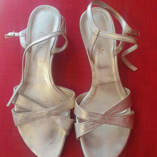 Nak gold sandals with low heel, used condition