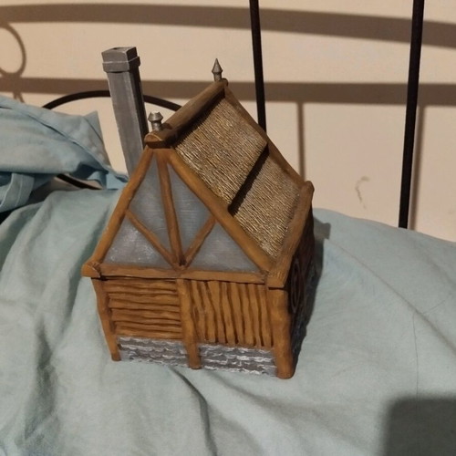 Dnd house like new with small broken part on roof