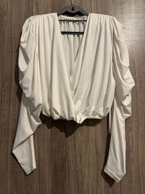 White wrap top new S/M with padded shoulders and sleeve gathers