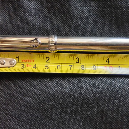Parafernalia pen used, metal chrome finish, 1980s design