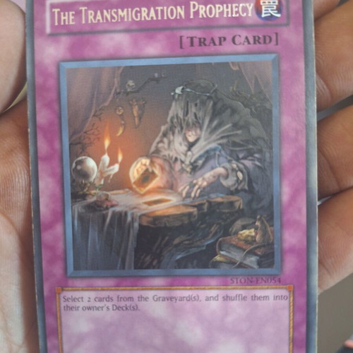 The Transmigration Prophecy Yu-Gi-Oh! card like new, ultimate rare STON-EN054