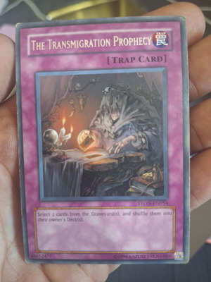 The Transmigration Prophecy Yu-Gi-Oh! card like new, ultimate rare STON-EN054