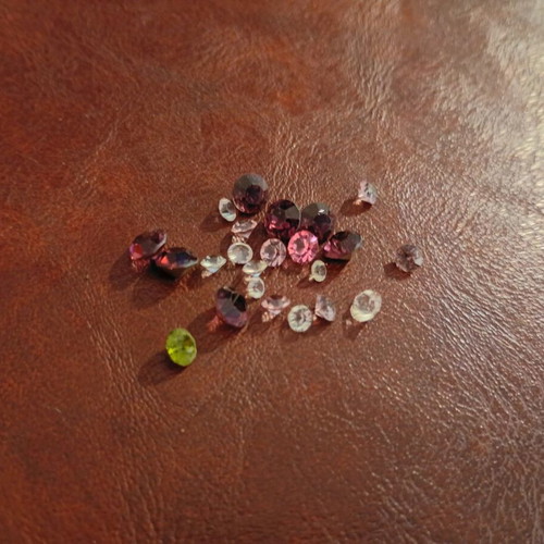 Semi-precious and precious stones like new, set of 23, round cut