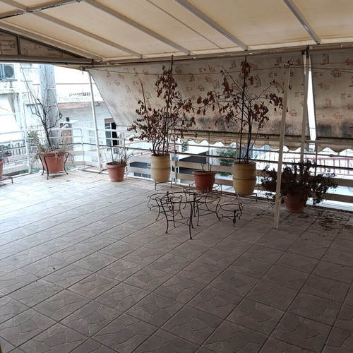 Multipurpose building with apartment and commercial space, Galatsi