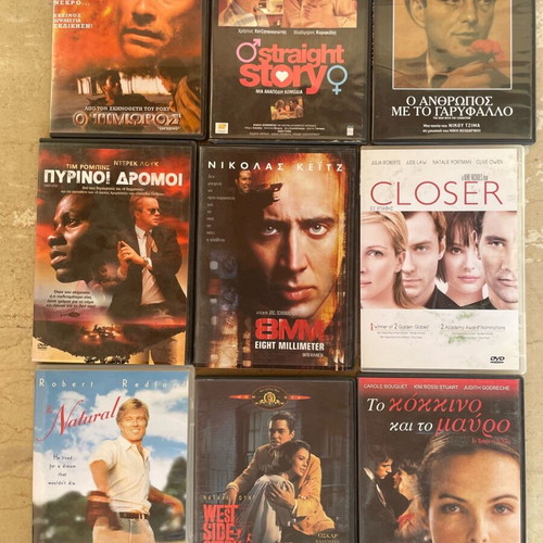 40 DVD movies in slim cases