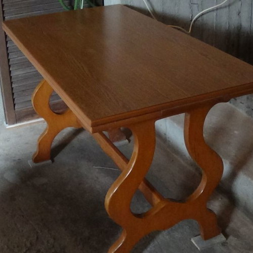 Wooden dining table used with extension