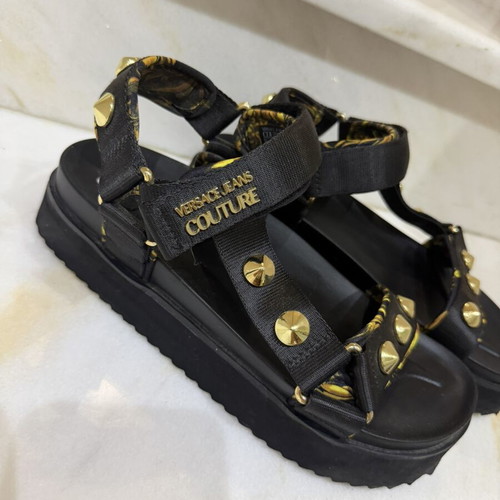 Versace sandals used, black and gold, size 40