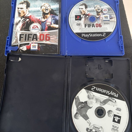 Bundle of used sports games for PlayStation 2 with manuals