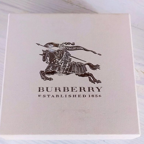 Burberry bracelet for hand like new, brown and yellow
