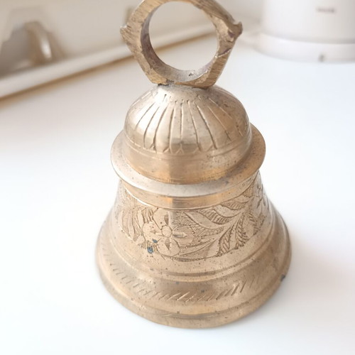 Bronze bell used with traditional engraved floral motifs