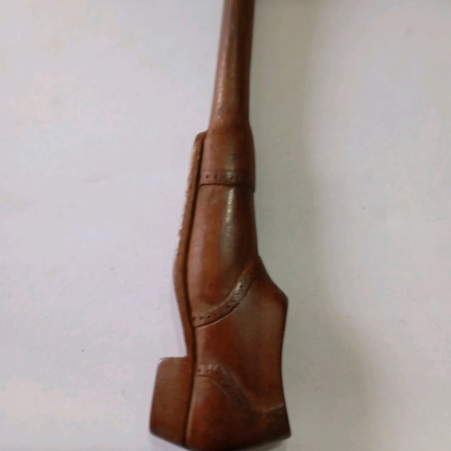 Vintage wooden smoking pipe used, shoe-shaped