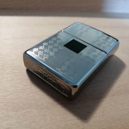Zippo lighter used with meander pattern designs