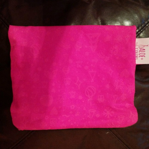 Aloe + Colors toiletry bag used, red Christmas design