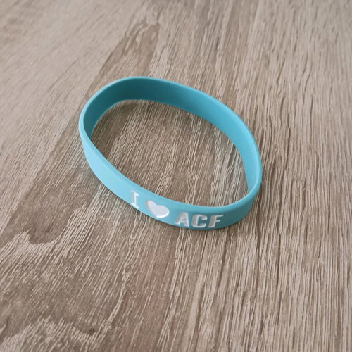Athens Coffee Festival bracelet like new, turquoise rubber unisex