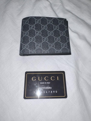 Gucci wallet new, black, with card
