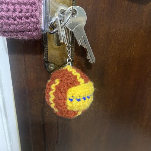 Crocheted ball keychain new, brown multicolor