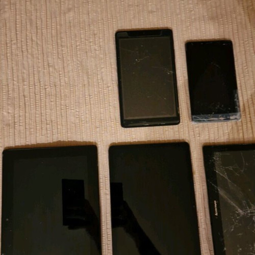 Various tablets used with damages for spare parts