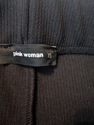 Pink Woman elastic pants XS used with slit on the bars