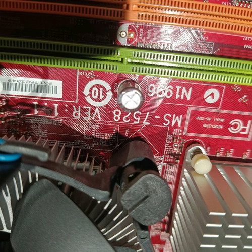 MSI G31M3-F motherboard used with Intel processor and heatsink