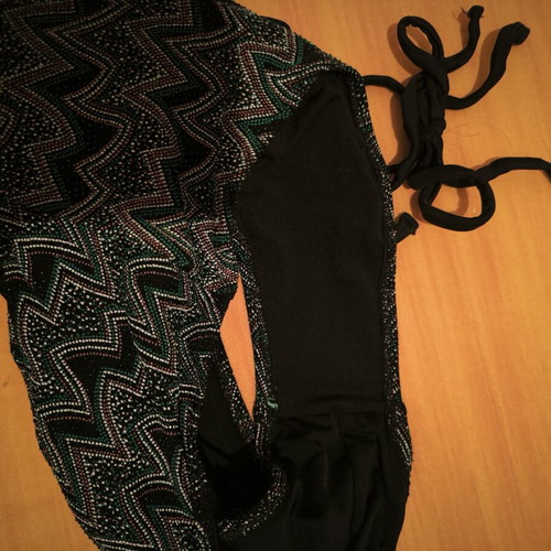 One-piece swimsuit like new with small beads, black and multicolor