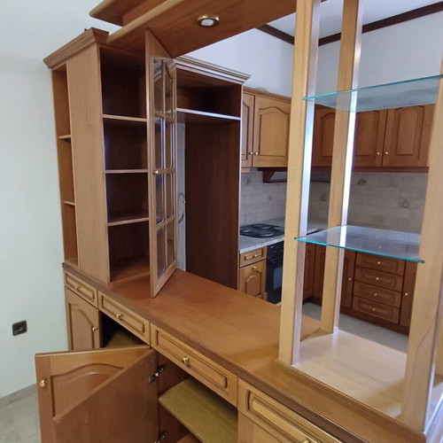 Wooden walnut display cabinet unit with lighting and storage spaces