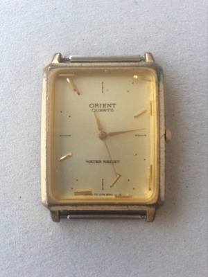 Orient C759E5 20 CS men's watch used, gold color, 1980s