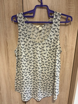 Sleeveless top with zebras H&M used, size M, black and white