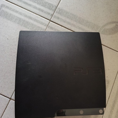 Sony PlayStation 3 Slim console like new with 2 games and cables