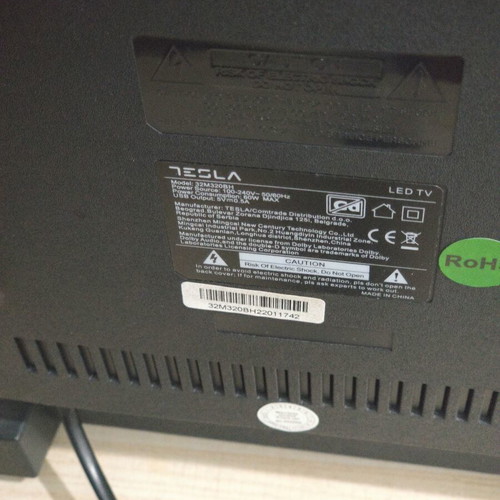 Tesla 32-inch TV with stand like new