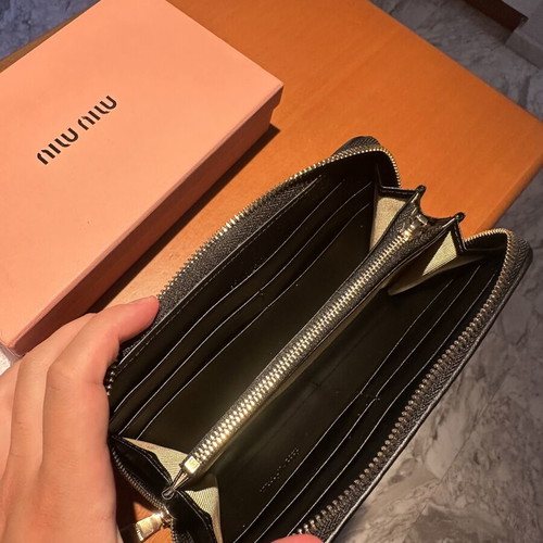 Miu Miu large black wallet like new with ample storage