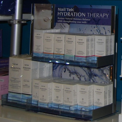 Tabletop plexiglass product display stand like new with metal decorations