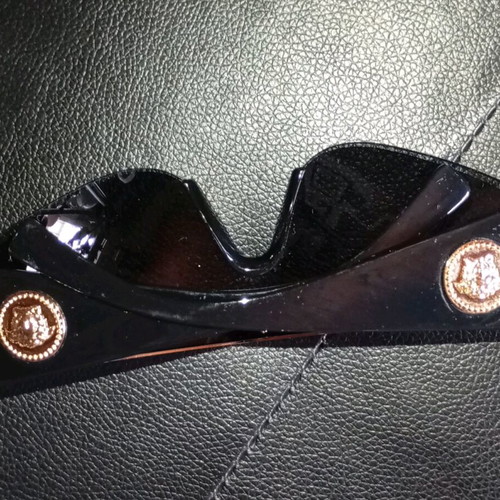 Versace 2197 women's sunglasses used, black and gold