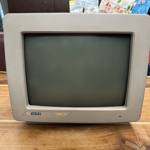 Atari 1040STFM with Atari SM124 monitor, original mouse and Greek manual used