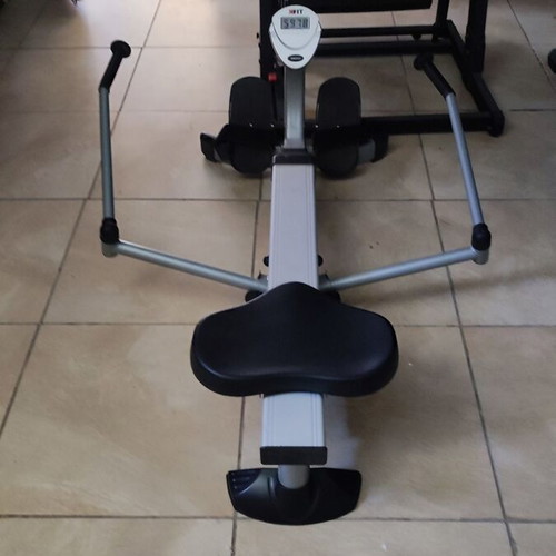 Elliptical rowing machine with adjustable training bench like new