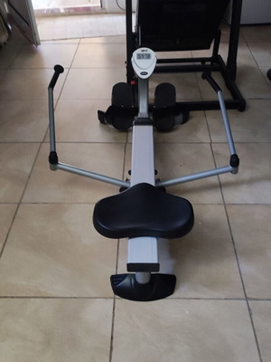 Elliptical rowing machine with adjustable training bench like new
