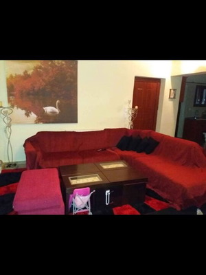 Large corner sofa with pouf like new