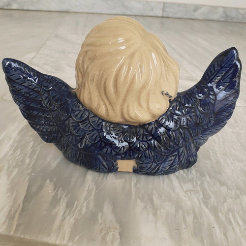 Ceramic angel used