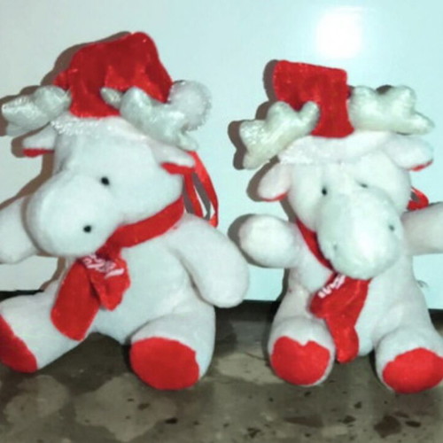 Collectible Coca Cola Christmas edition plush dolls like new
