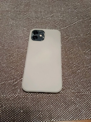 Apple iPhone 12 64GB like new with cracked back and 3 cases
