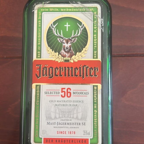 Jagermeister collectible bottle used, empty with Light & Hawk label