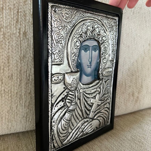 Religious icon used with metal overlay on wooden base