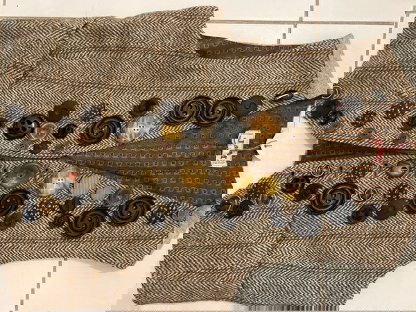 Vest with embellished buttons