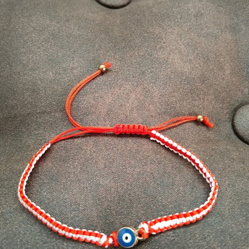 Martaki bracelet like new, red with evil eye