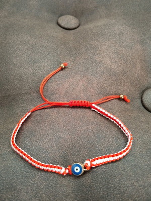 Martaki bracelet like new, red with evil eye