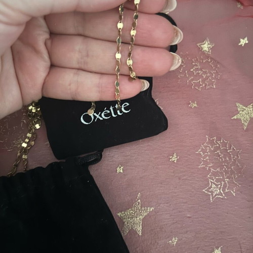 Oxette jewelry set like new, gold necklace and earrings