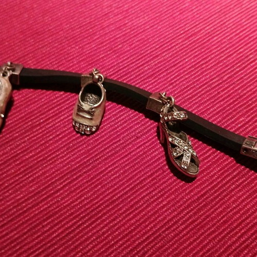 Rubber bracelet with charms like new
