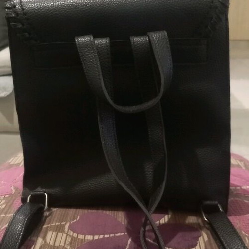Black synthetic backpack bag used