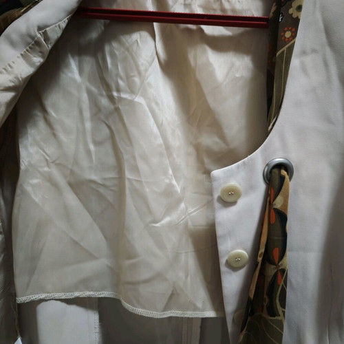 Elegant Vagias Collection suit like new with floral details