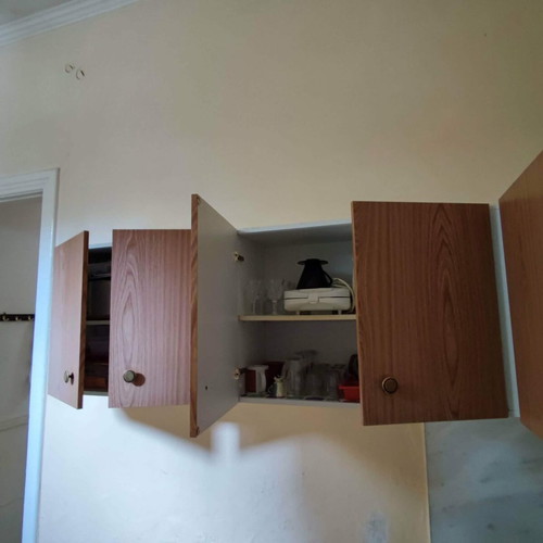 Kitchen cabinets used, two rows made of novopan